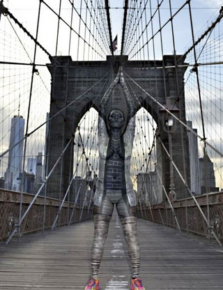 Illustration for article titled Women's bodies blend into a city's background with just bodypaint